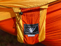 Parachute Silk Camping Hammock • Puka’ana/Sunset • Double XXL 6.5’x10’ • 440 lb Rated • Includes Carabiners & Stuff Sack • Ultralight & Packable • Handcrafted in Bali Since 1996
