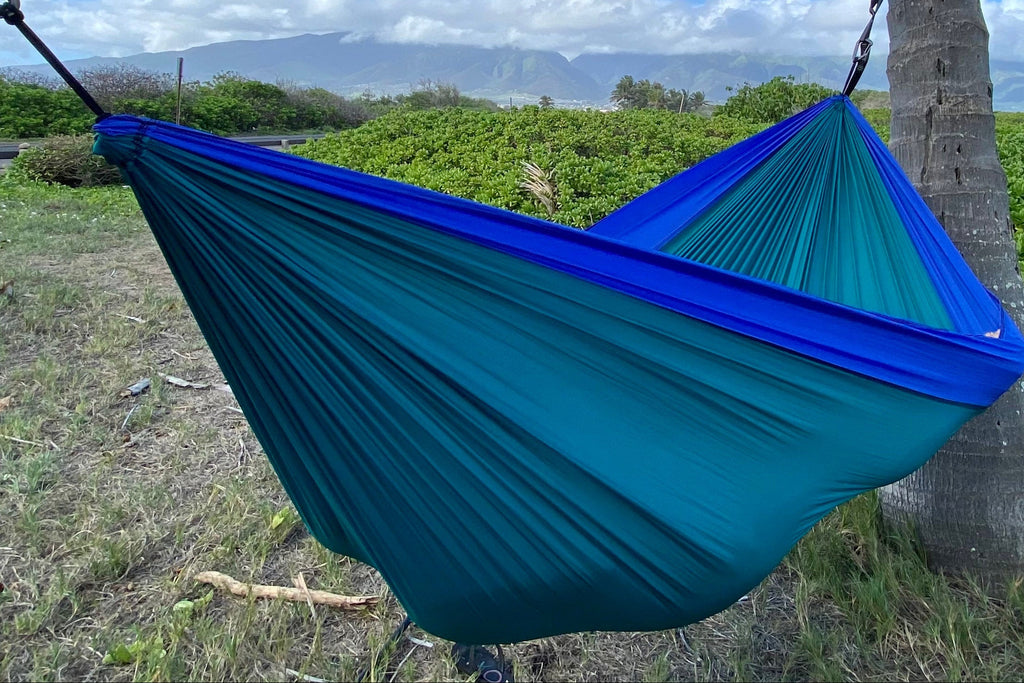 Parachute Silk Travel Hammock • Double 6.5’x10’ • 440 lb Rated • Includes 24 kN Carabiners & Stuff Sack • Ultralight & Breathable • Handcrafted in Bali Since 1996
