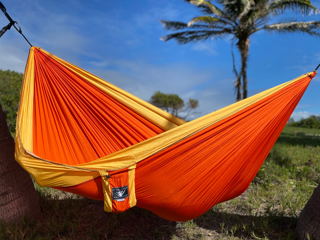 Parachute Silk Camping Hammock • Puka’ana/Sunset • Double XXL 6.5’x10’ • 440 lb Rated • Includes Carabiners & Stuff Sack • Ultralight & Packable • Handcrafted in Bali Since 1996
